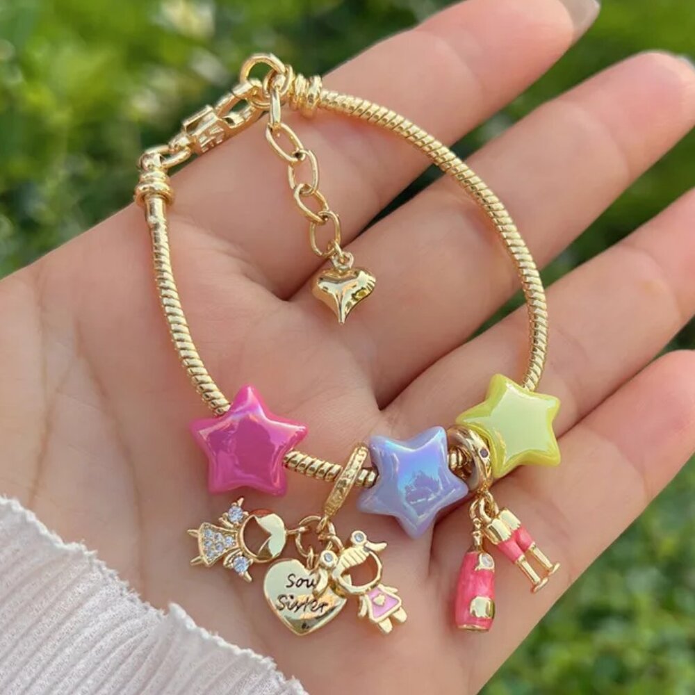 Porcelain star bracelet with charms inlaid with cubic zirconia